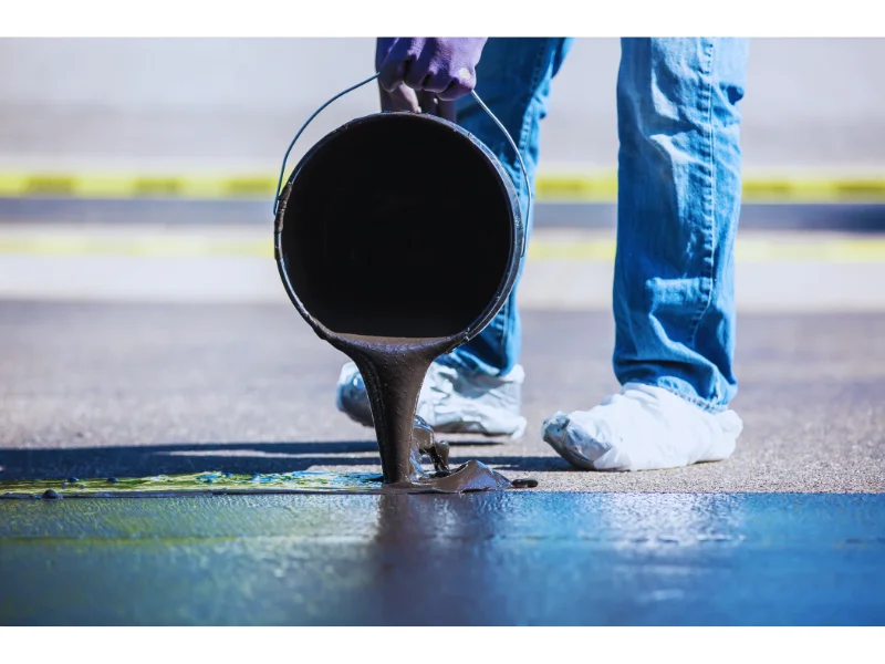 putting asphalt on concrete